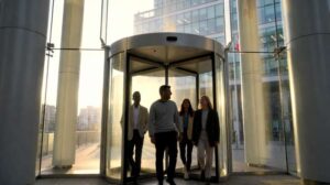 Diverse professional entering Canadian building